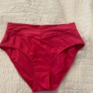 Pepper high waisted bikini bottom. Size medium. Pink. Never worn